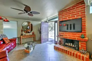 Tucson Vacation Rental, Big Back Yard, The exposed brick fireplace serves as a beautiful element to the living room