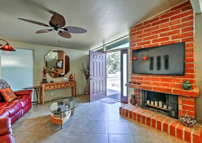 Tucson Vacation Rental, Big Back Yard, The exposed brick fireplace serves as a beautiful element to the living room